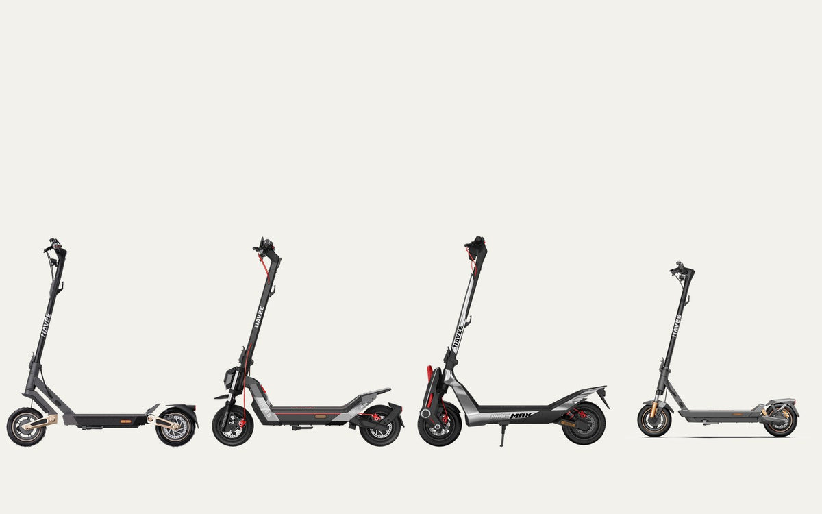 Vier NAVEE e-steps naast elkaar in zijaanzicht: ST3 Pro, NT5 Max, UT5 Max en GT5 Max
